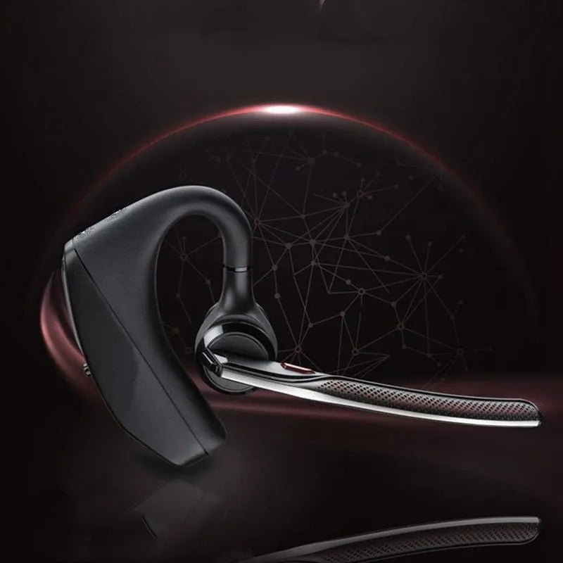 Black wireless sports headphones with a large battery and built-in microphone on a plain background.