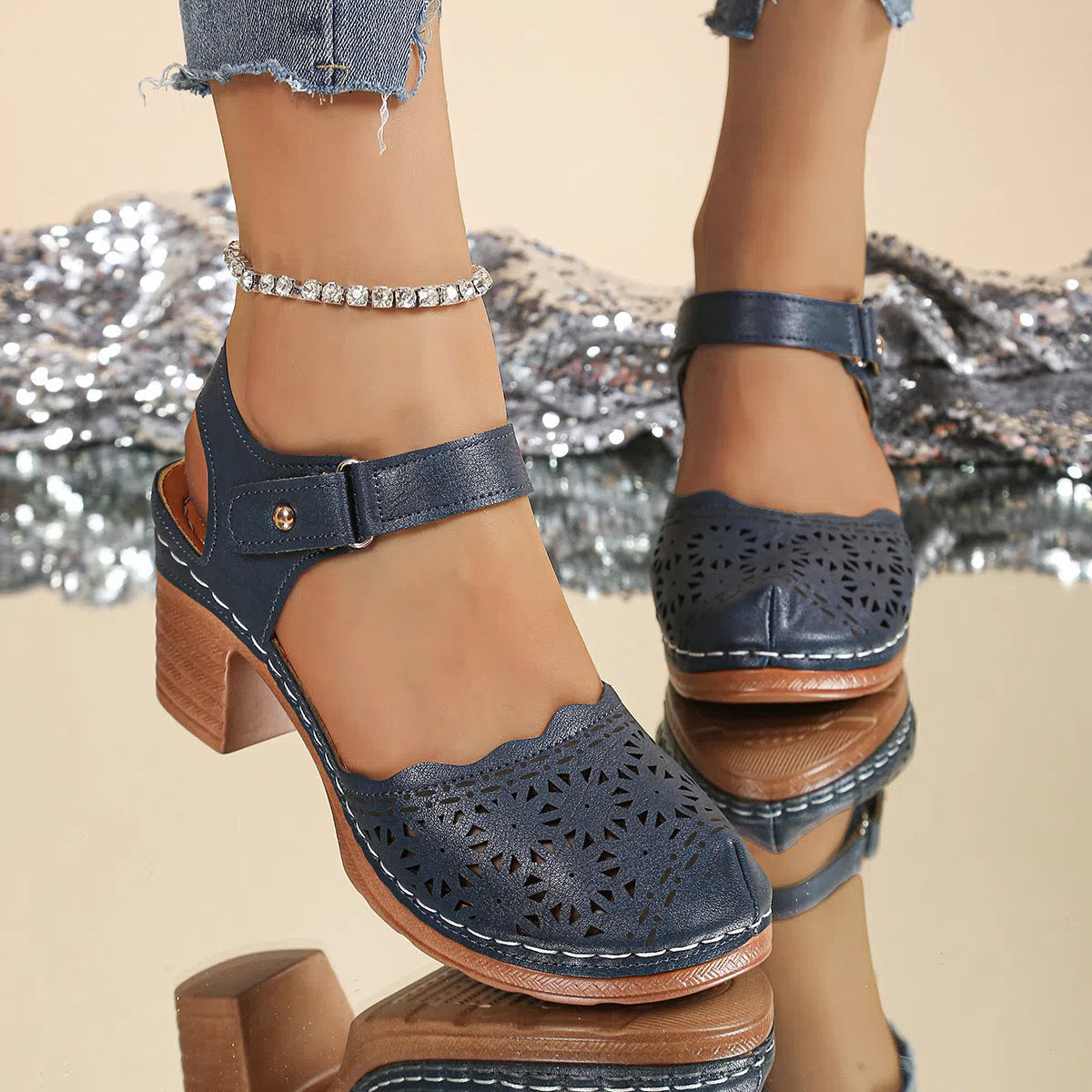 Women's hollow-out chunky-heel closed-toe sandals in black with Velcro strap and rubber outsole