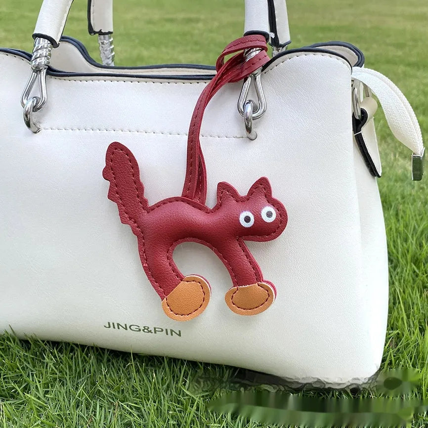 Mini PU leather cat bag pendant animal pattern 8.5x9cm in black on white background