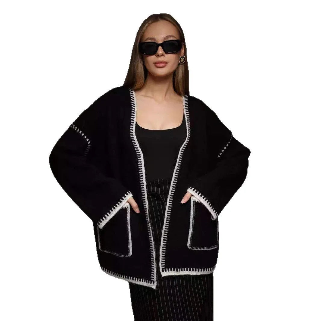 White lace-up knitted cardigan sweater coat with long sleeves and mid-length design
