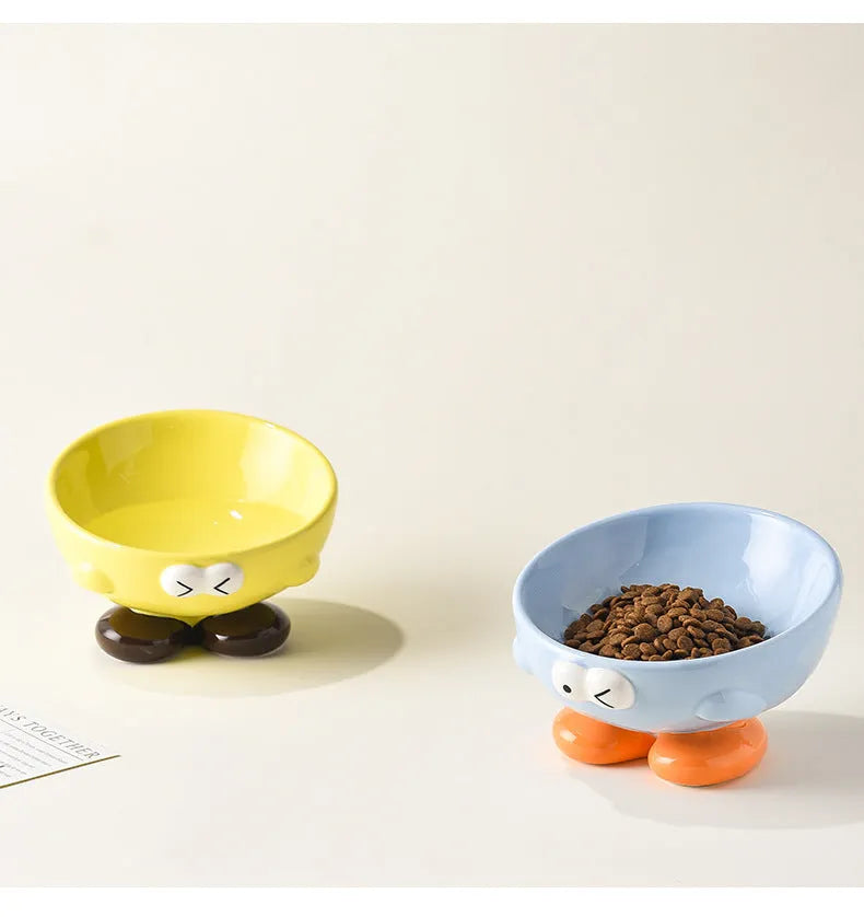 Blue oblique tall ceramic bowl for cat or dog food, designed for cervical spine support.