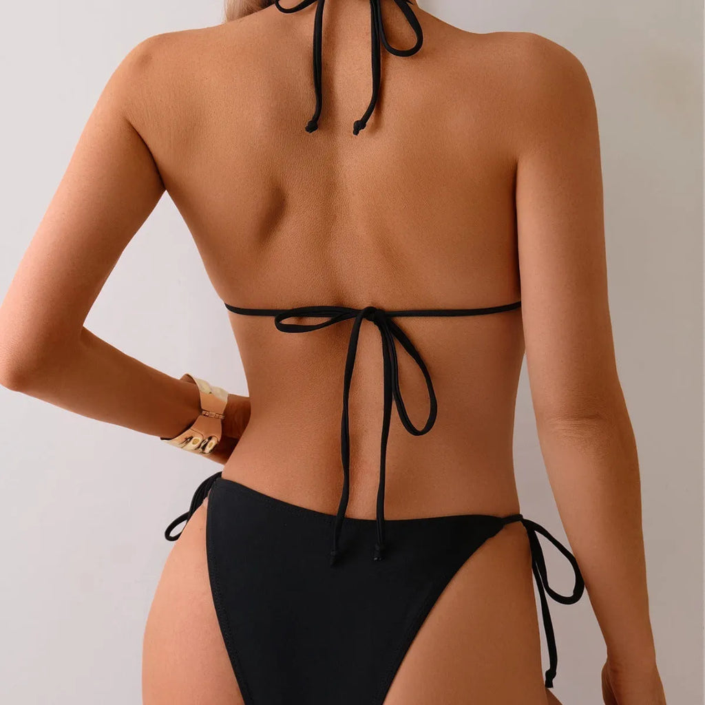 Black women's bikini swimsuit with metal bead fastening system for swimming
