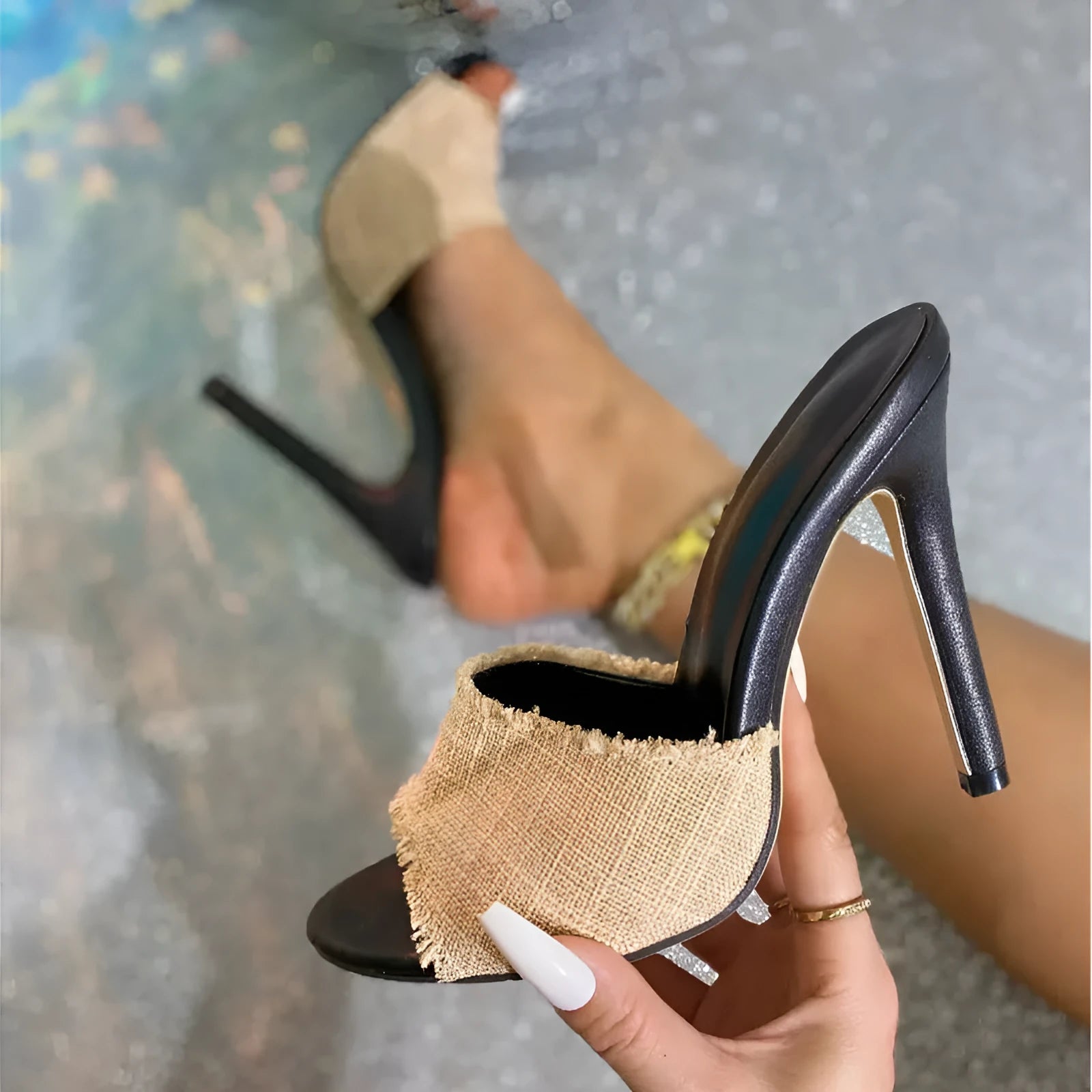 Apricot coloured women's stiletto sandals with separate toe design and mixed sheepskin fur and cowhide upper.