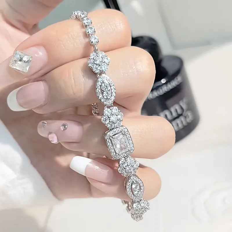 Women's S925 sterling silver-plated bracelet with white gold finish and inlaid zircon stones.