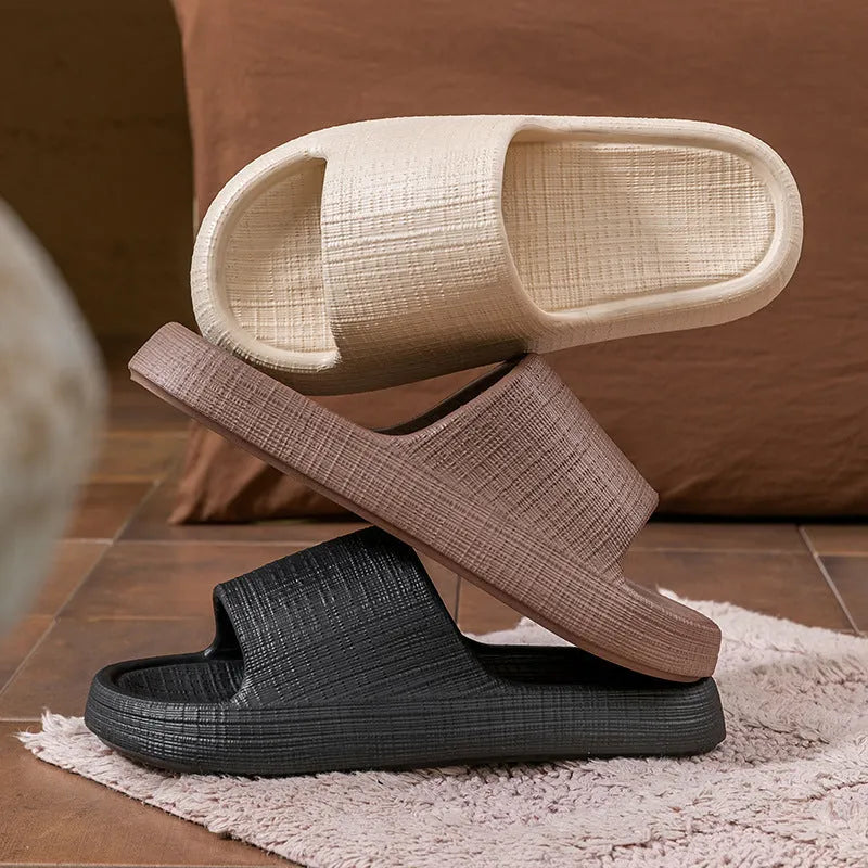 Pair of adult unisex EVA toe-ring slippers in a chosen colour, showing the non-slip sole and flip-flop design.