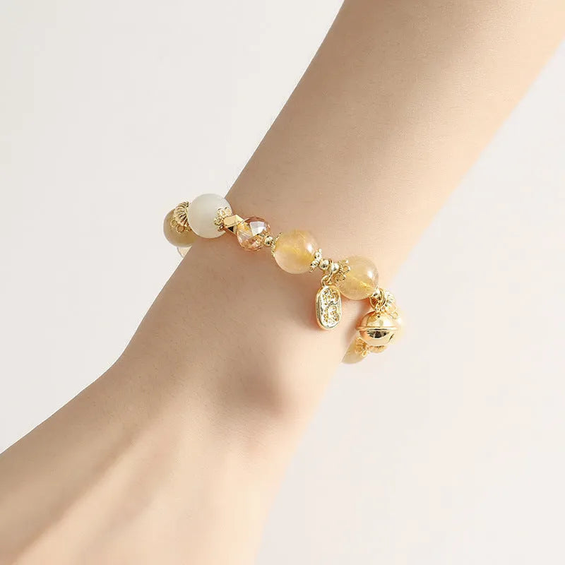 Gold electroplated rutilated quartz crystal bracelet with Korean style design