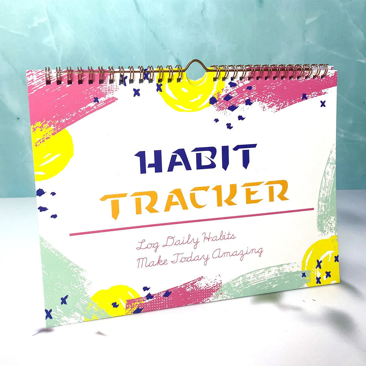 A4 habit tracking journal with 12 pages in four colour options for daily schedule planning