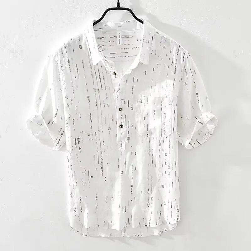Men's loose fit short sleeve polo shirt in black, shown on a model.