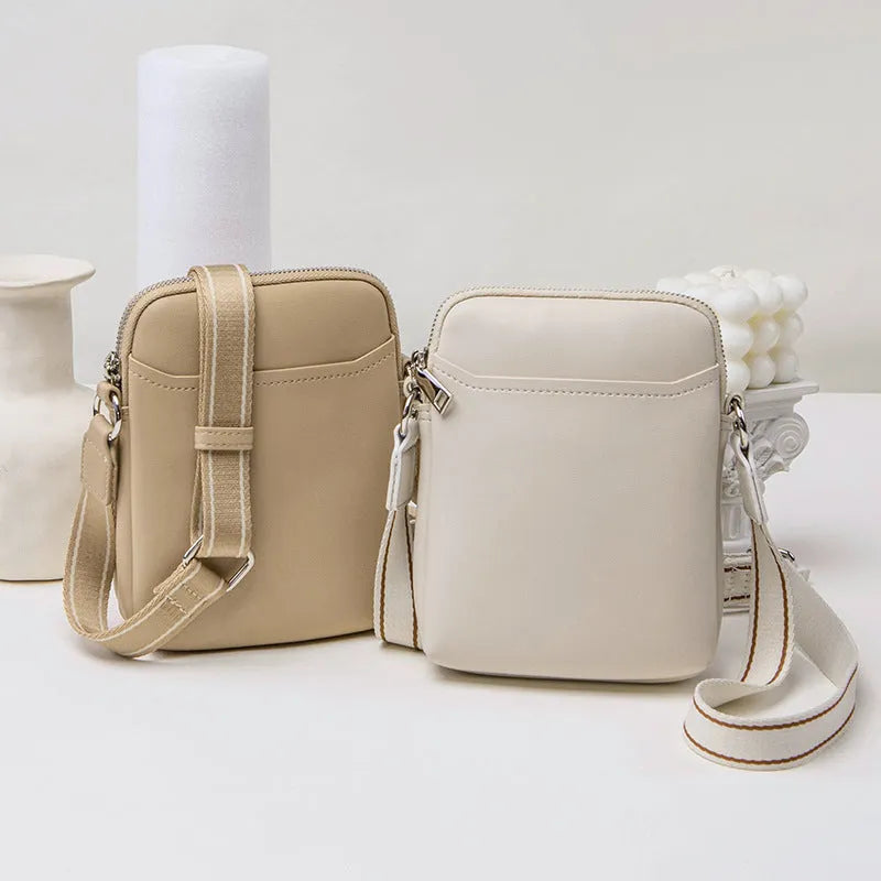 Solid colour mobile phone crossbody shoulder bag in PU material showing front view