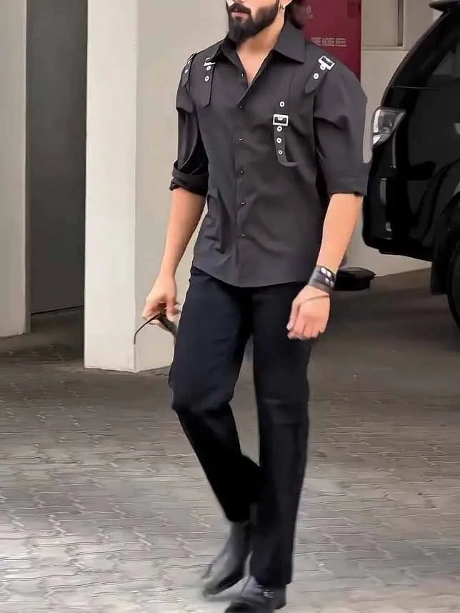 Men's black utility style polyester button up shirt on a hanger