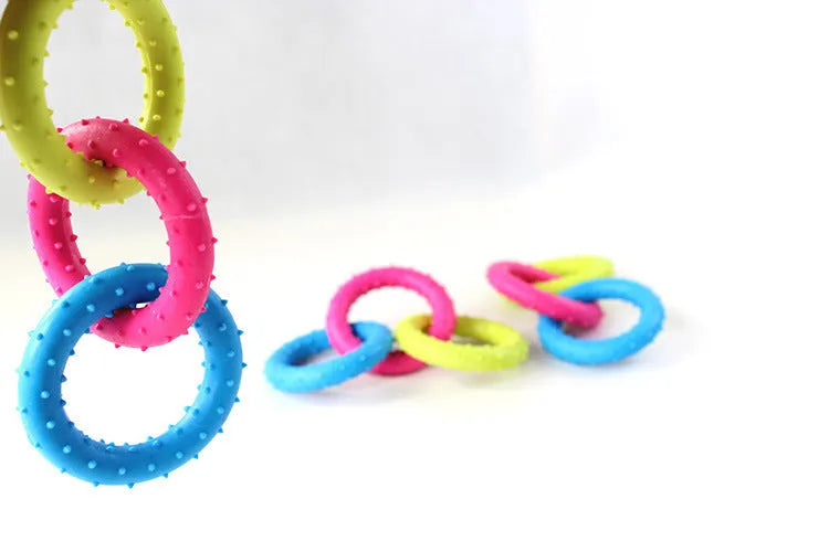 TPR rubber three-chain link dog molar chew toy for large breed dogs on a white background.