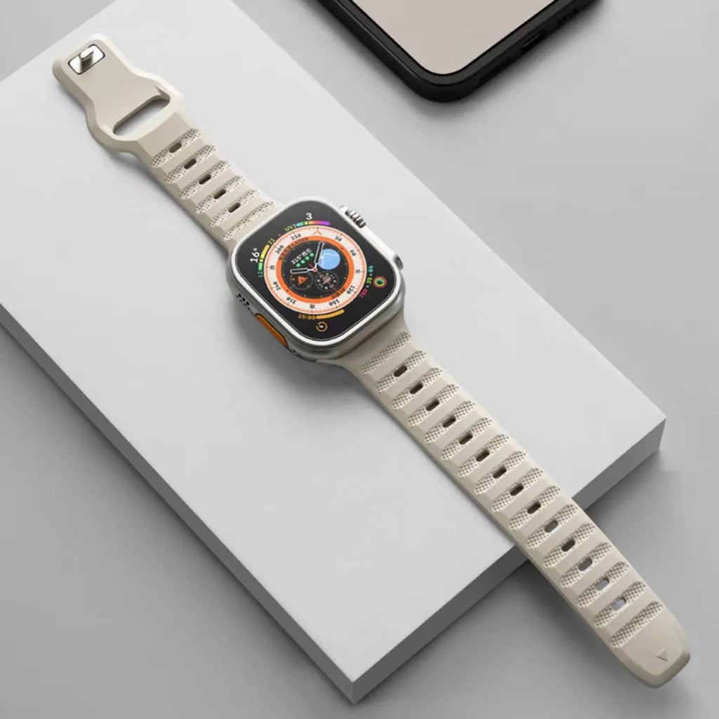 Fluoro rubber replacement strap for Apple Watch in multiple colour options on a watch case.