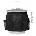 Black cylindrical polyester storage bag hanging on a 5 gallon barrel for organising tools.