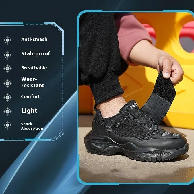 Black safety work shoes with steel toe cap and felt buckle closure on a white background
