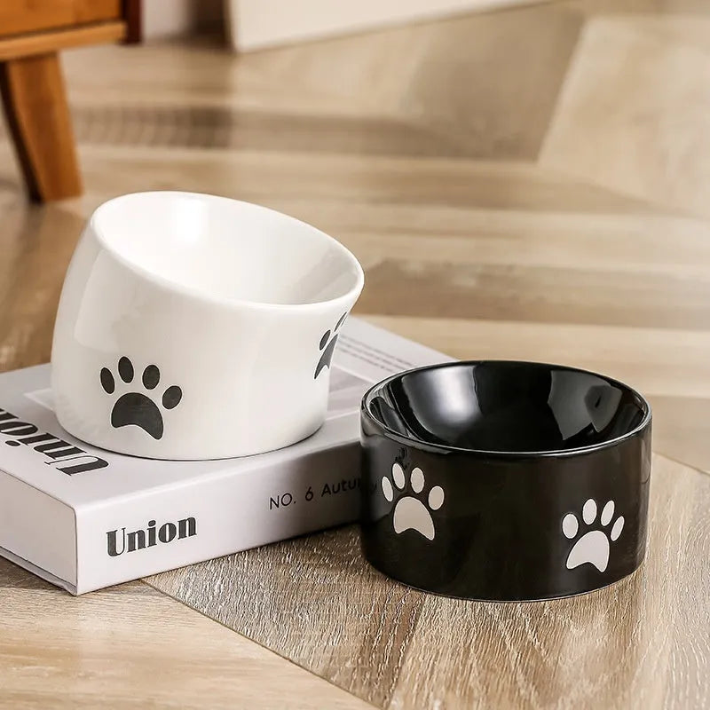 Ceramic cat paw design pet bowl with high-foot base in slanted mouth style