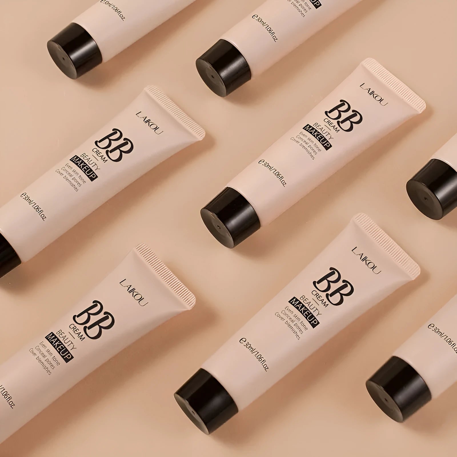 30ml tube of BB cream foundation showing nine colour shade options from ivory white to brown.