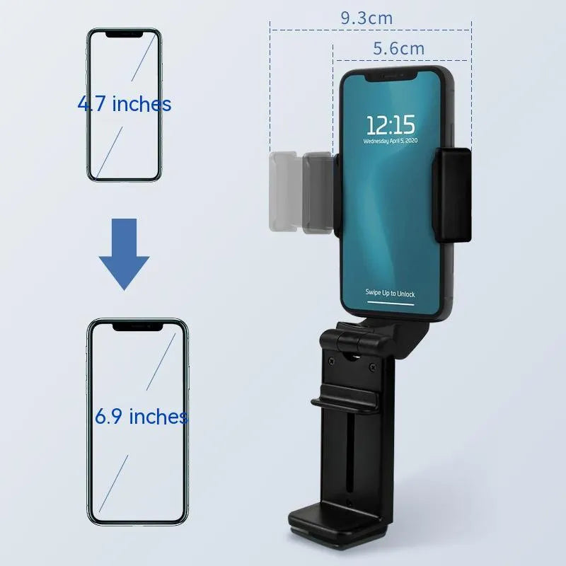Black 360-degree rotating collapsible phone holder on desktop showing adjustable viewing angles