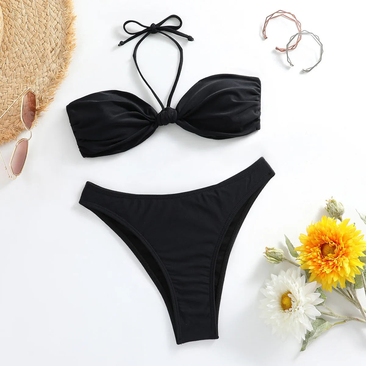 Black women's swimwear set with lace-up tube top and matching briefs