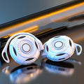 Black and white wireless Bluetooth earphones with hanging ear design