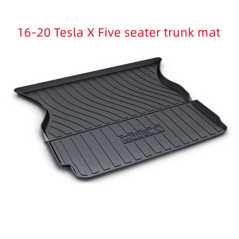 Custom rubber floor mats for Tesla cars, showing TPE footrest section and model-specific contours.