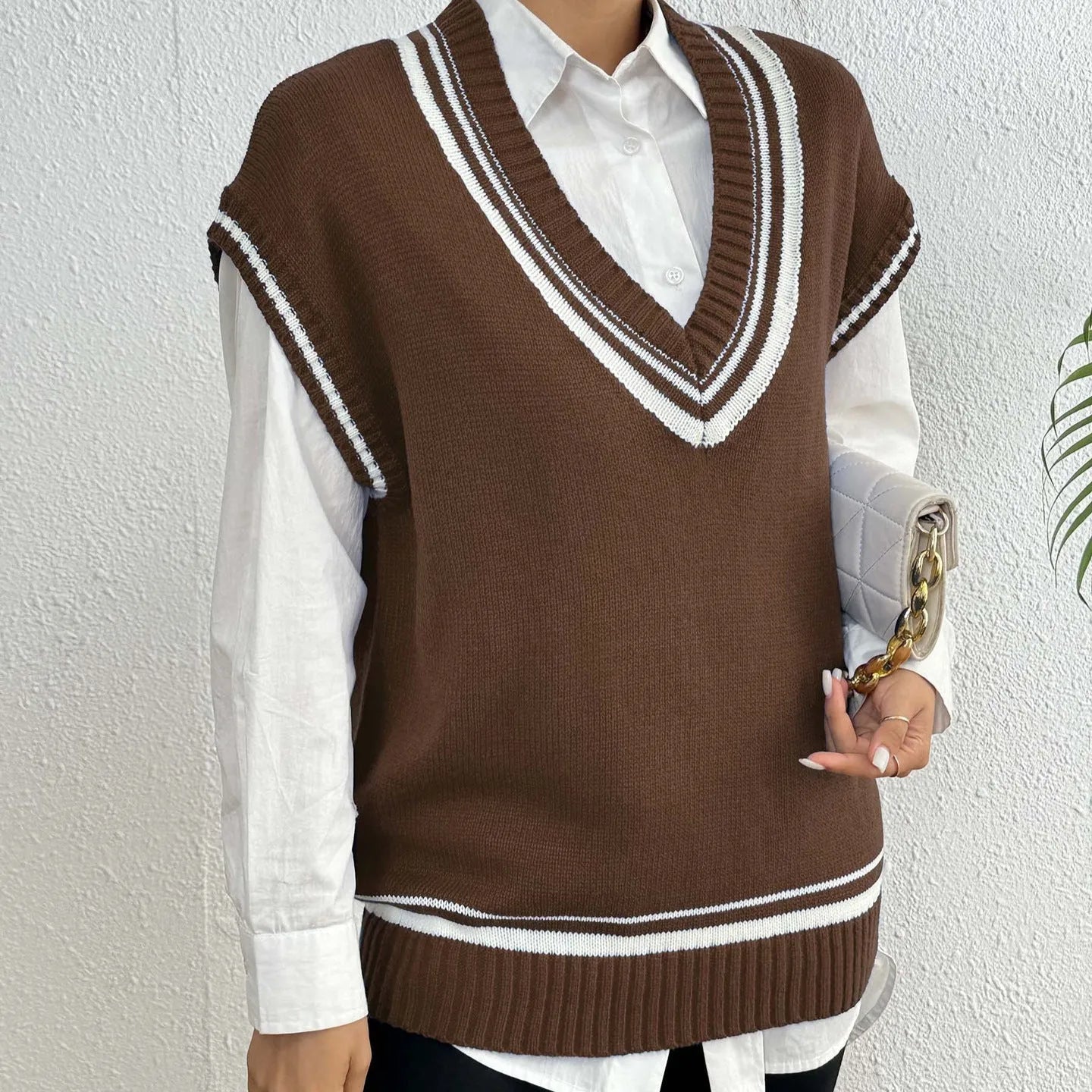 Women's loose fit wool blend vest sweater in college style with pullover design