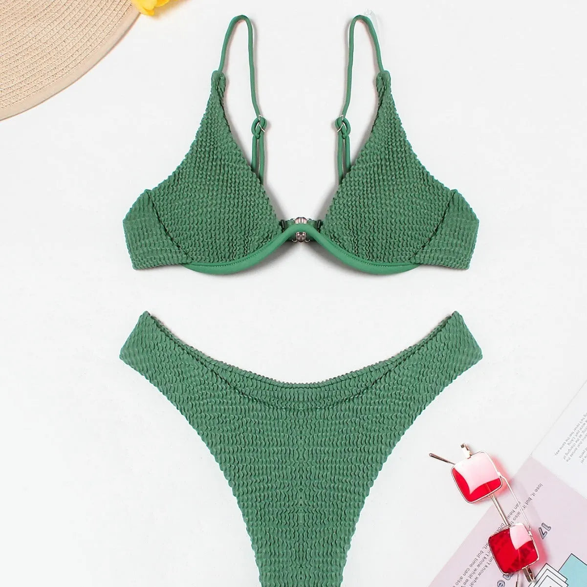 Green women's bikini swimsuit with ruffle detail and split-style briefs