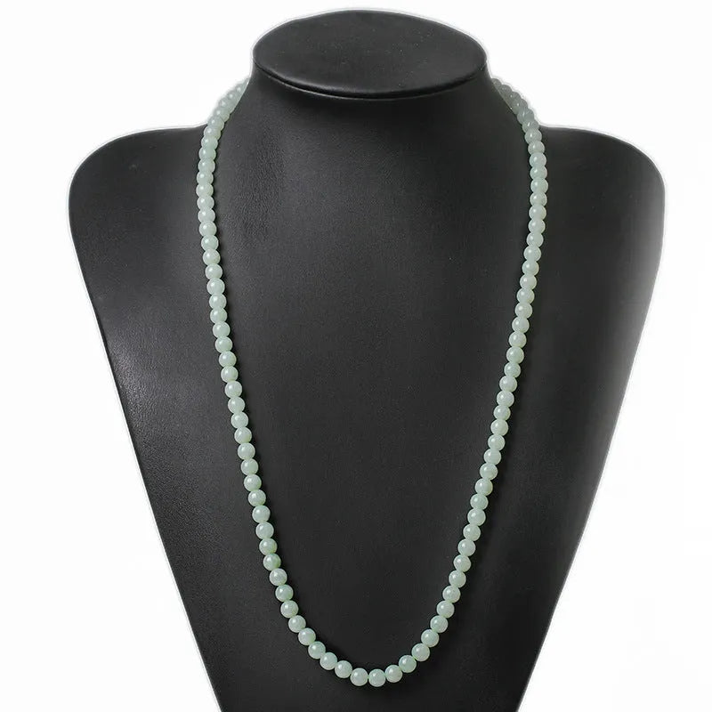 Natural jade bead necklace with round white and green beads on adjustable chain
