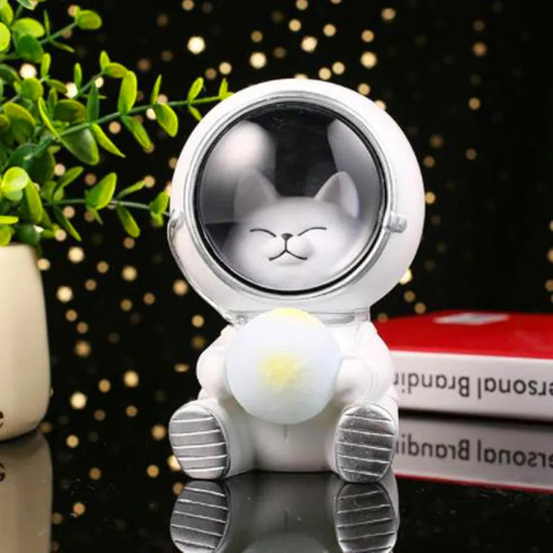 Resin animal night light in bear design with starry sky LED glow on a table.