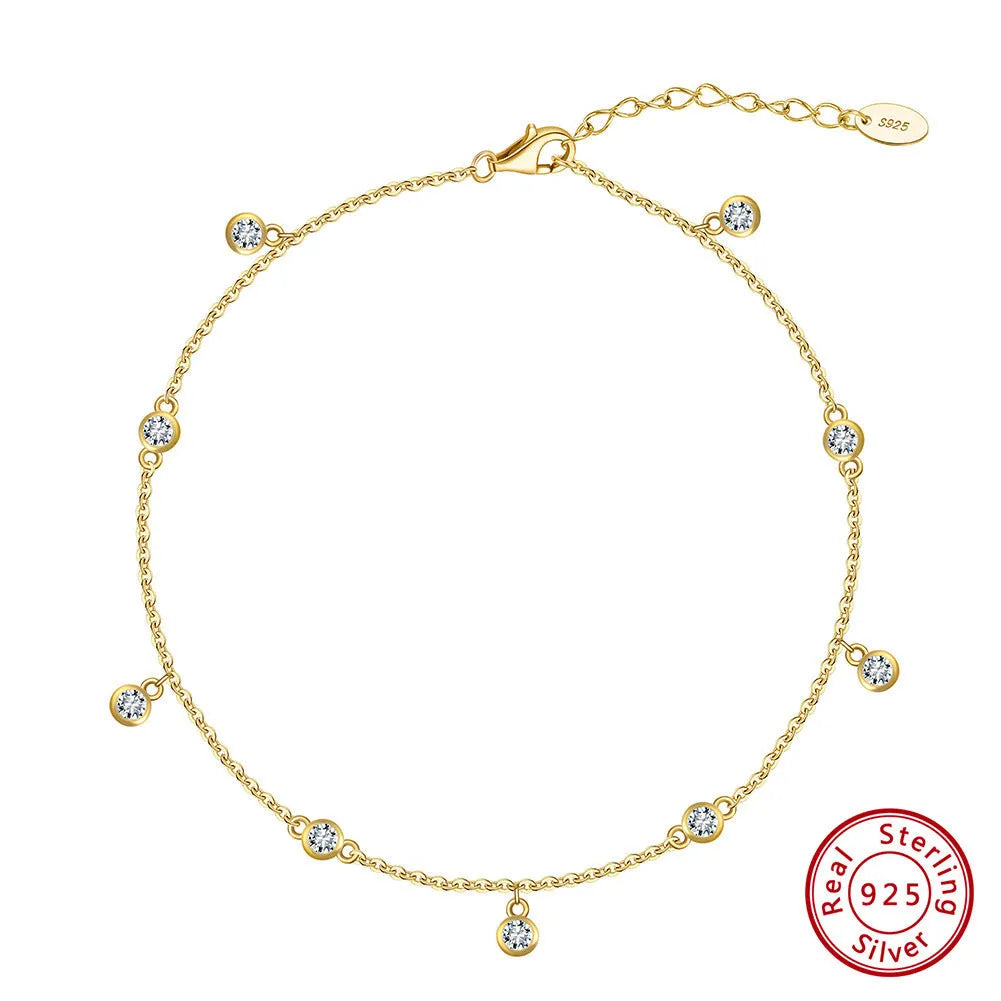 Women's sterling silver anklet with a small geometric zirconium pendant in a gold or white gold colour.