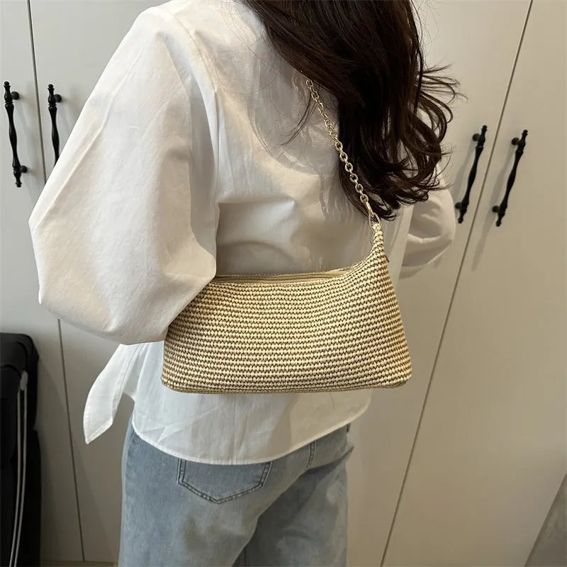 Straw woven shoulder tote bag in horizontal square shape with sandwich pocket and mobile phone compartment