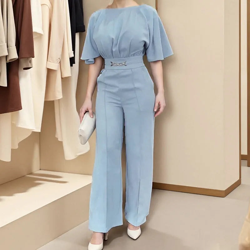 Blue men's polyester suit set with trousers and a long-sleeve top on a mannequin.