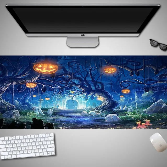 Oversized Halloween-themed mouse pad with non-slip rubber base on a desk.