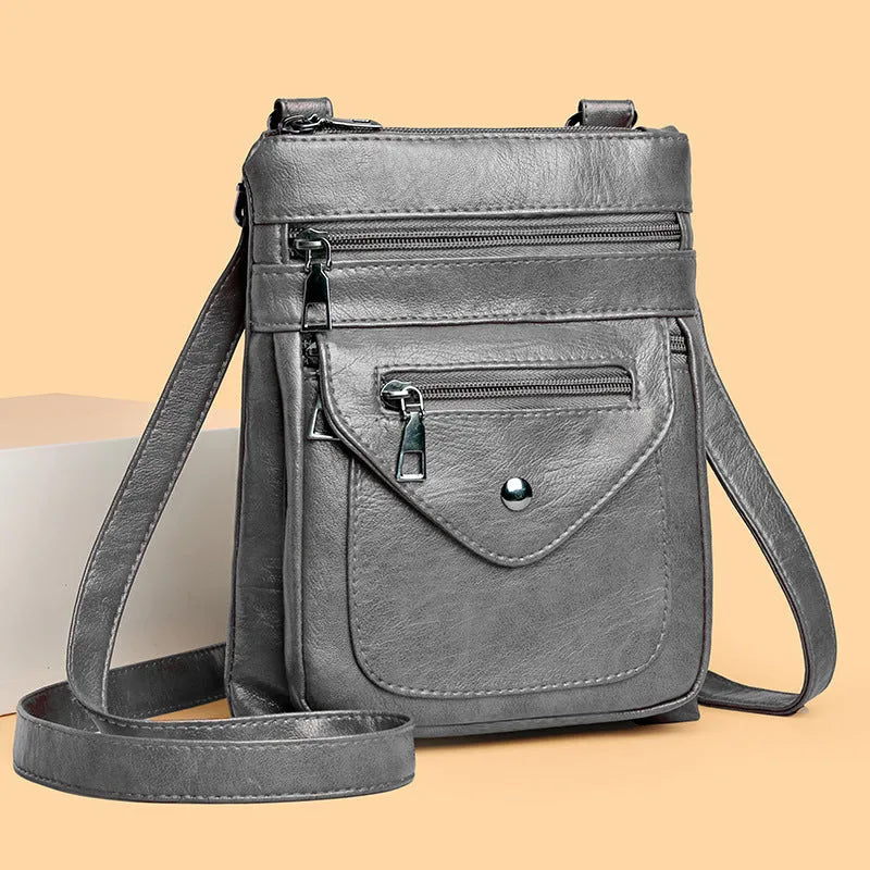 Vertical square crossbody mobile phone bag for women in PU material with sewing line detailing