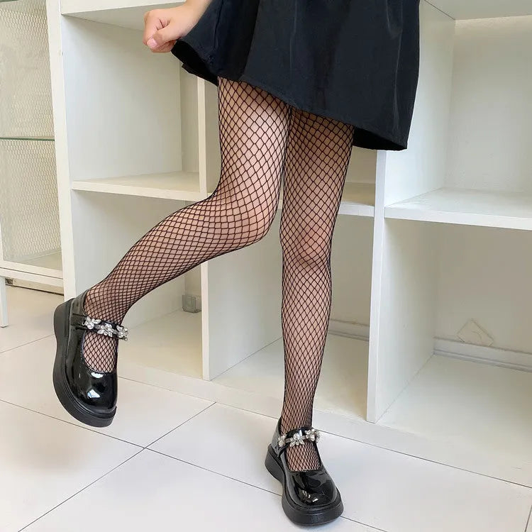Women's summer mesh stockings showing large, medium and small pattern variations in black and white colours