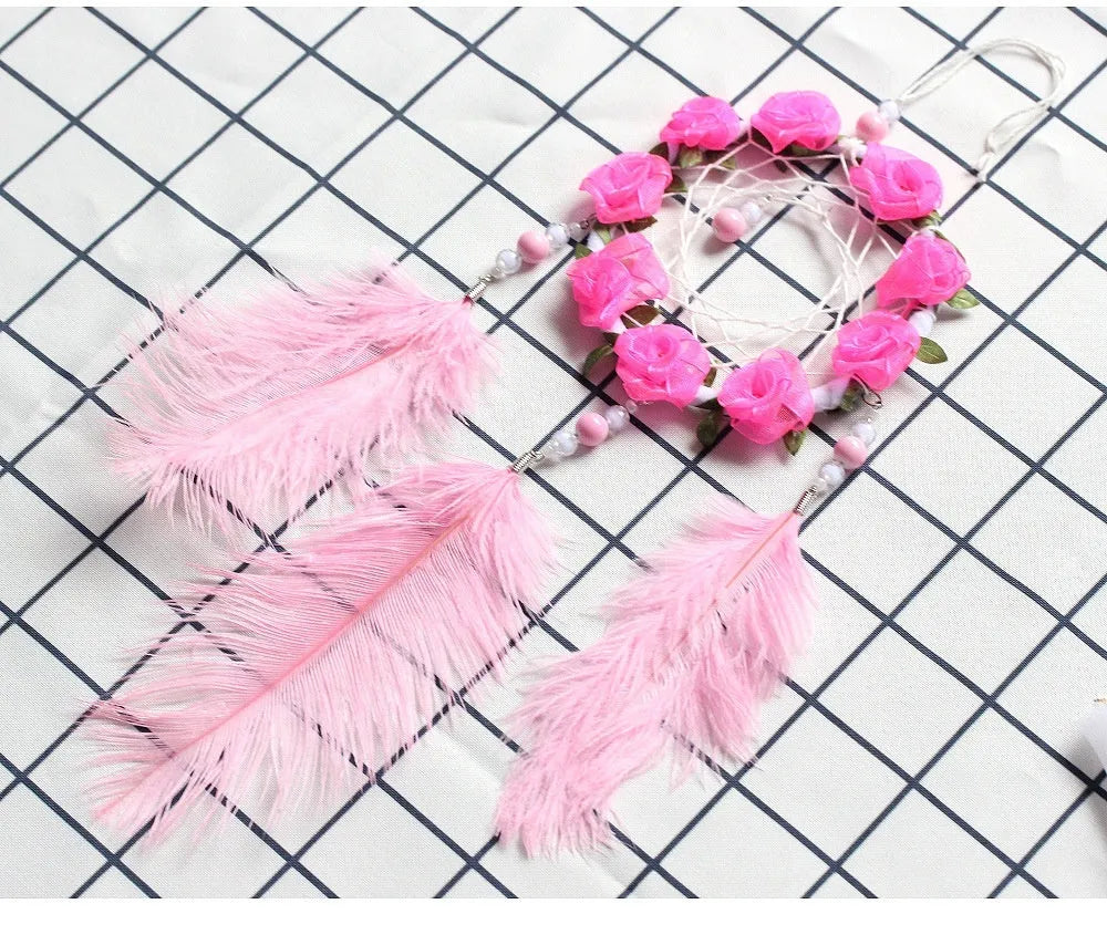 Pink ostrich feather dreamcatcher wind chime wall decoration measuring 10cm