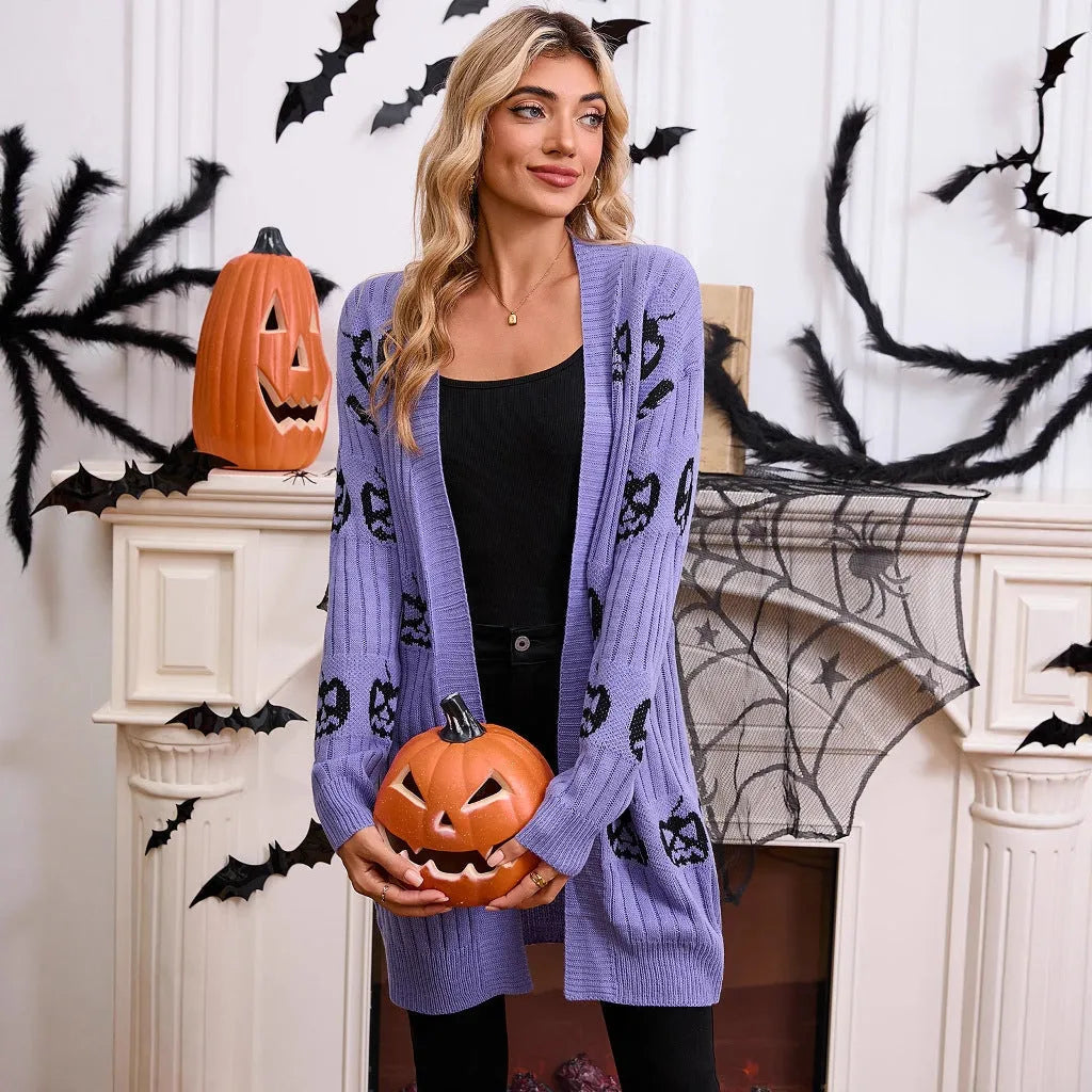 Women's black Halloween cardigan with orange pumpkin head jacquard knitting.