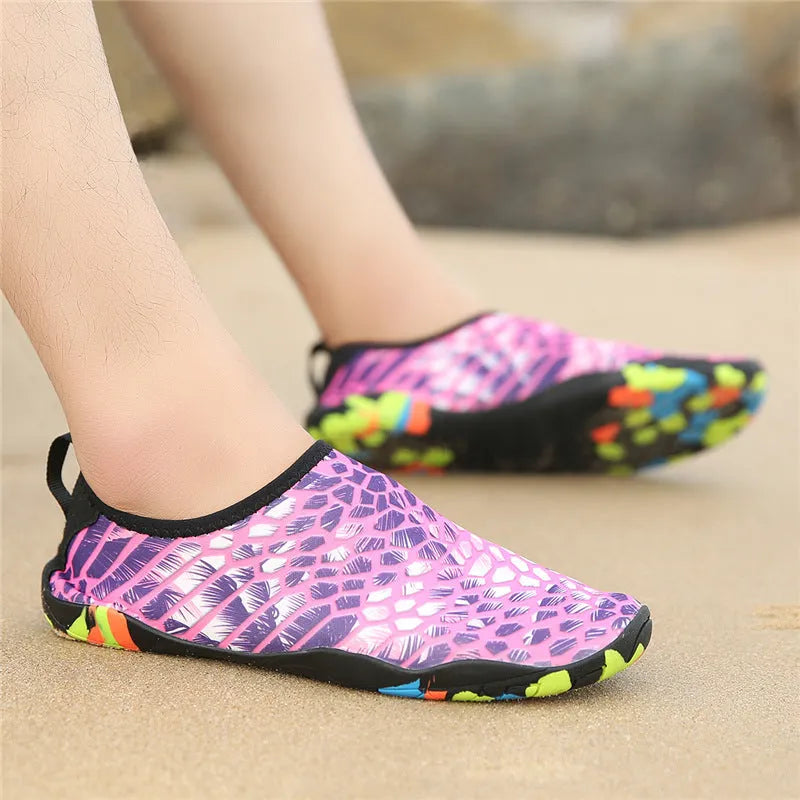 A pair of blue quick-dry beach wading shoes with Lycra uppers and EVA midsoles for water sports.