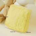 Quilted silk storage bag for women in candy colours showing medium and large size options