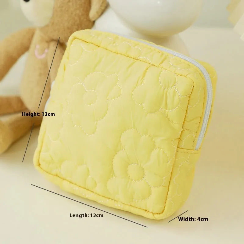 Quilted silk storage bag for women in candy colours showing medium and large size options