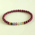 Purple gold sand crystal string beads bracelet showing natural colour variation and handcrafted construction