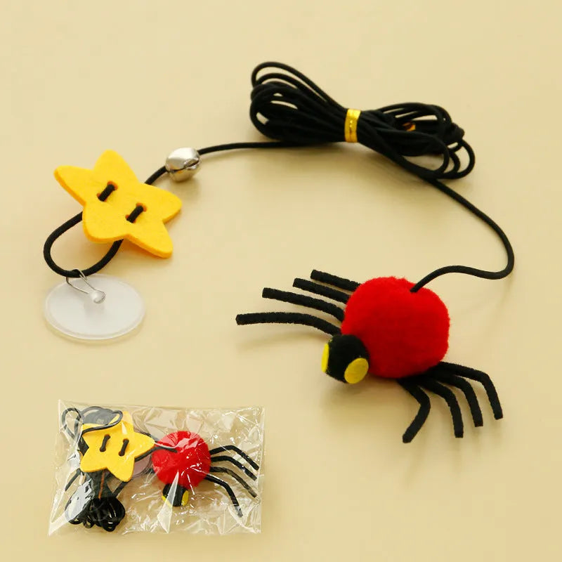 Red or yellow elastic rope cat toy with feather stick and fabric spider bell hanging from a door