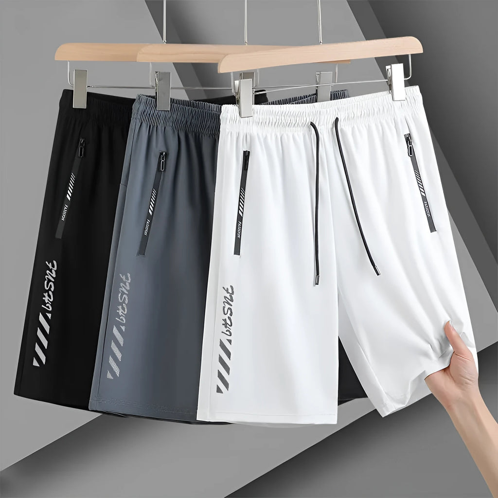 Men's black quick-drying nylon sports shorts with loose fit and medium elastic waistband