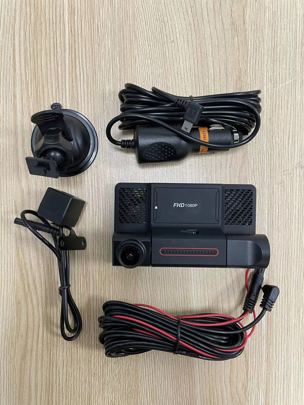 Black three lens dashcam with 4 inch touch screen for front and rear vehicle recording