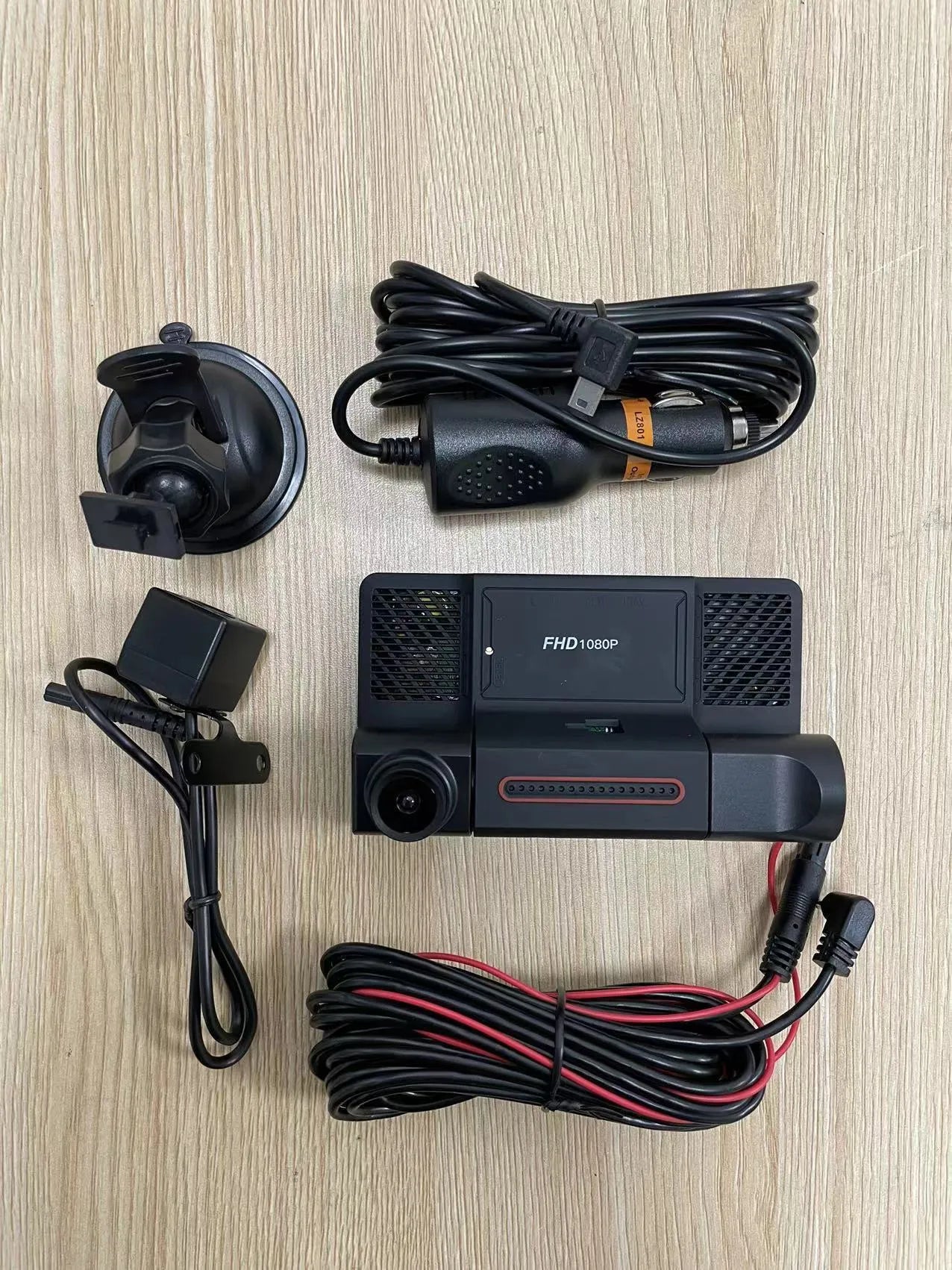Black three lens dashcam with 4 inch touch screen for front and rear vehicle recording