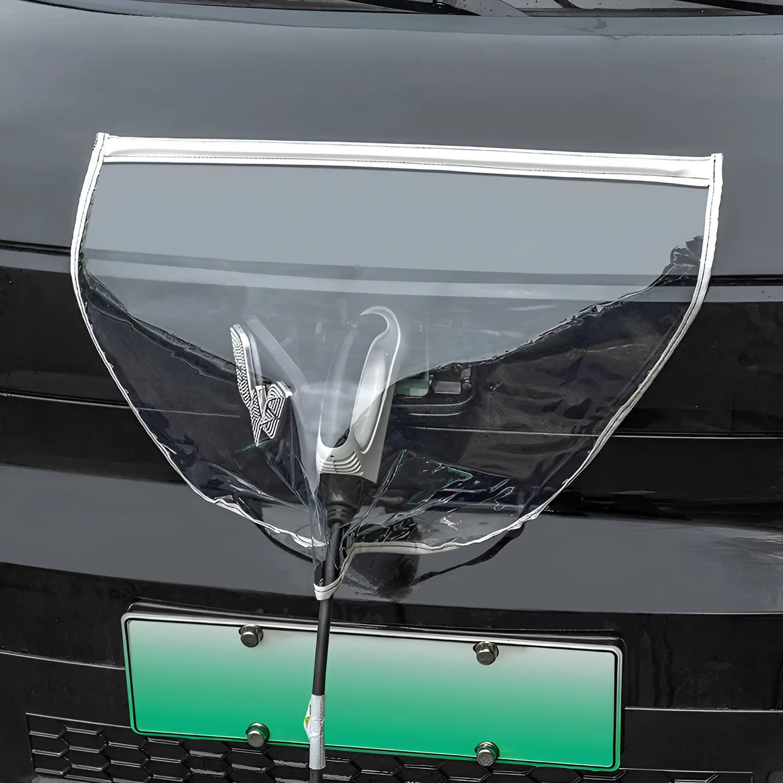 Black electric vehicle charging gun rain cover with magnetic strips unfolded to show 60cm by 50cm size