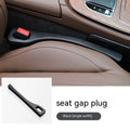 Black polyurethane car seat gap strip preventing items from falling between vehicle seats.
