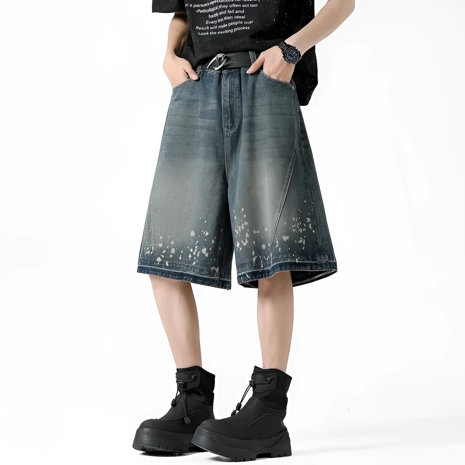 Men's retro blue denim shorts with ripped details, splash ink design, and five-point star decorations on a straight-leg cut.