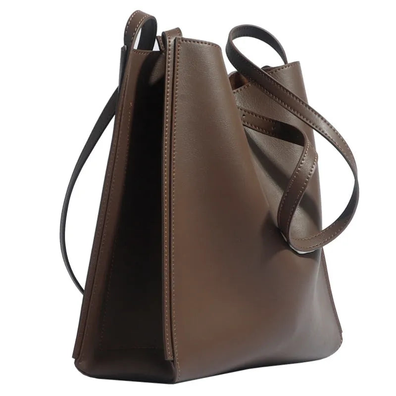 Brown genuine leather women's bucket bag with double shoulder straps and slit pocket