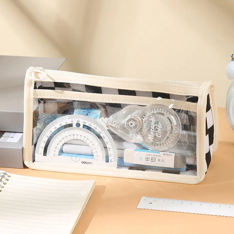 Transparent PVC pencil case with chessboard pattern, showing pens inside, dimensions 21.5cm by 8cm by 11.5cm