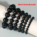 Hand-woven obsidian couple bracelets in various colours including black, silver, and rainbow eye obsidian